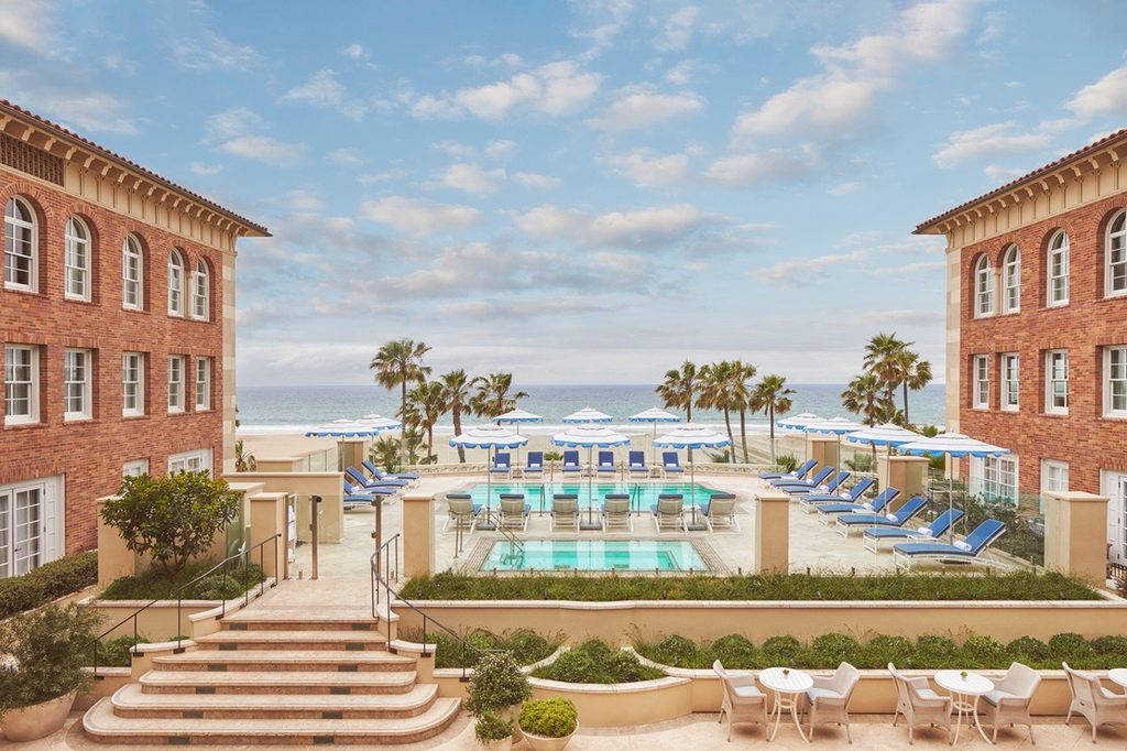 Pool deck at Hotel Casa del Mar overlooking the beach in Santa Monica