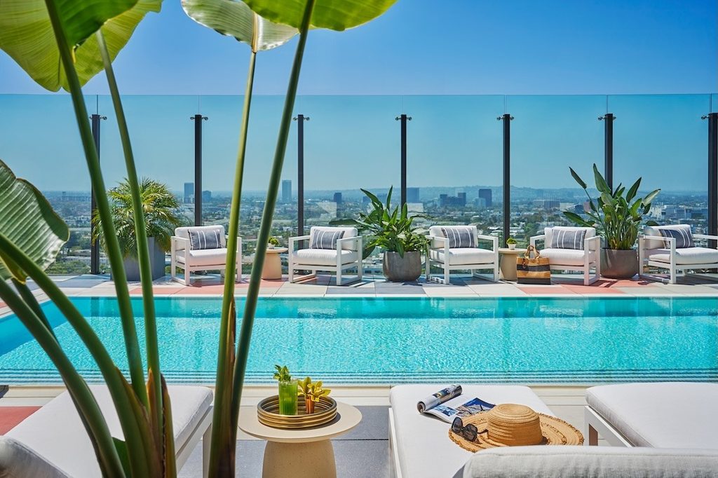Rooftop pool with city views at The Sun Rose West Hollywood