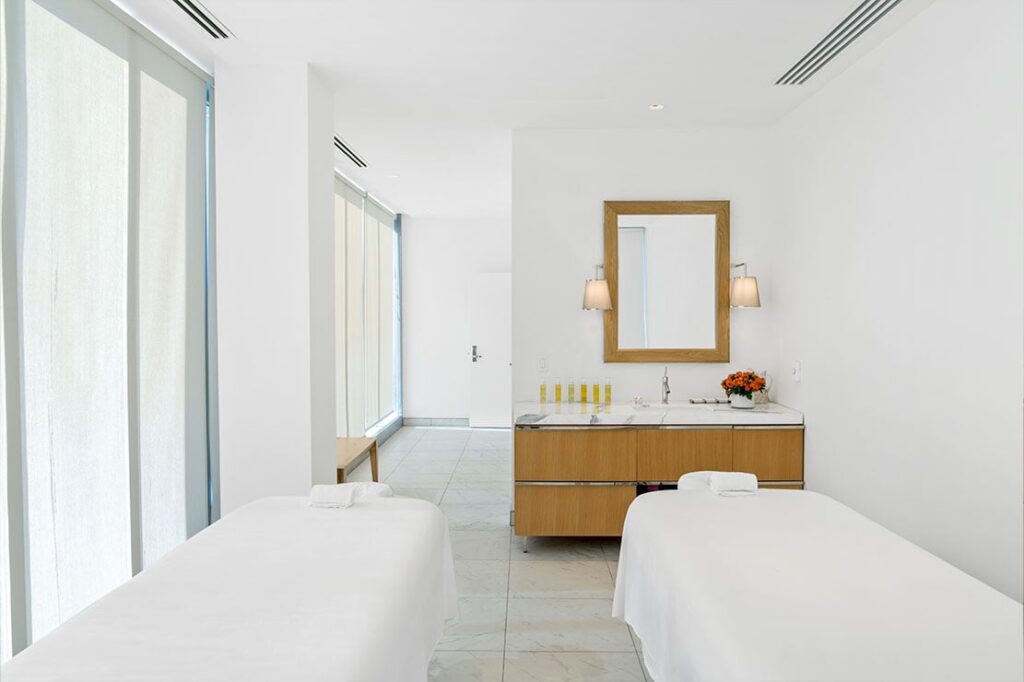Treatment room with two tables at The Spa at Lotte Hotel Seattle